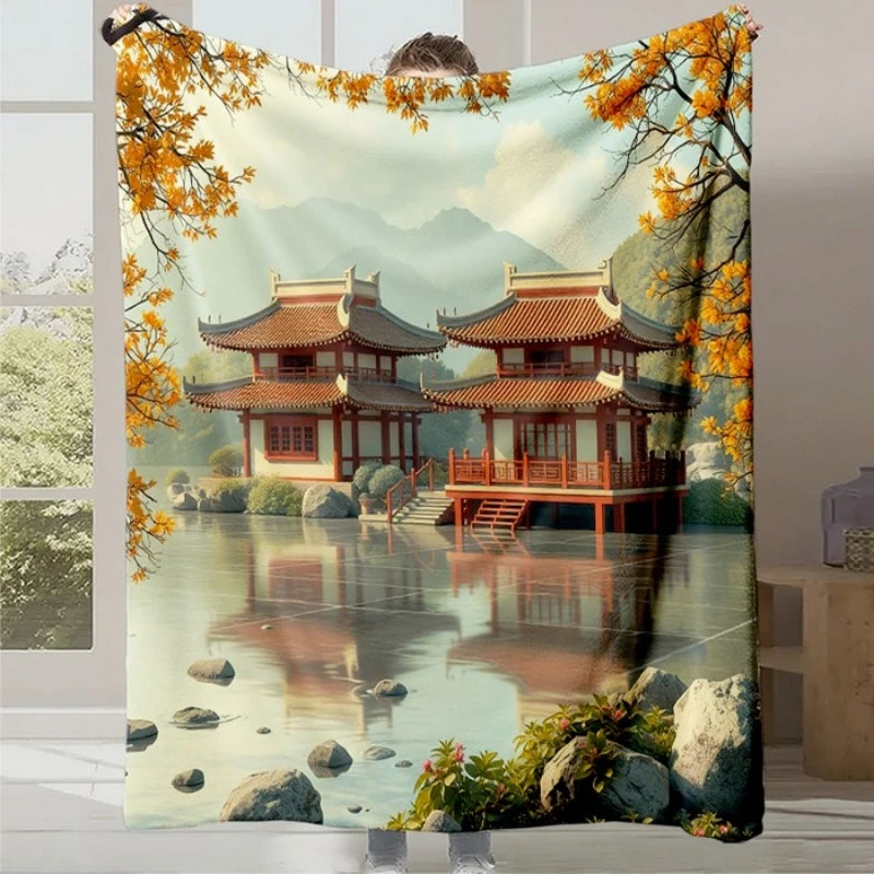 Un paysage pittoresque avec des pavillons traditionnels japonais reflétés dans un lac serein entouré de montagnes et de feuillages d'automne.