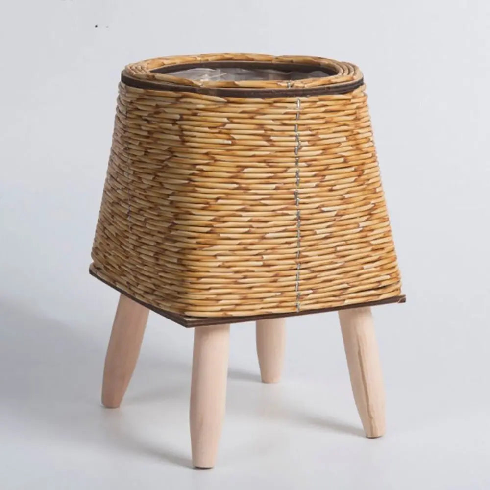 cache pot tressé rotin moderne cactus feuilles vertes marron clair pieds bois durable tissé