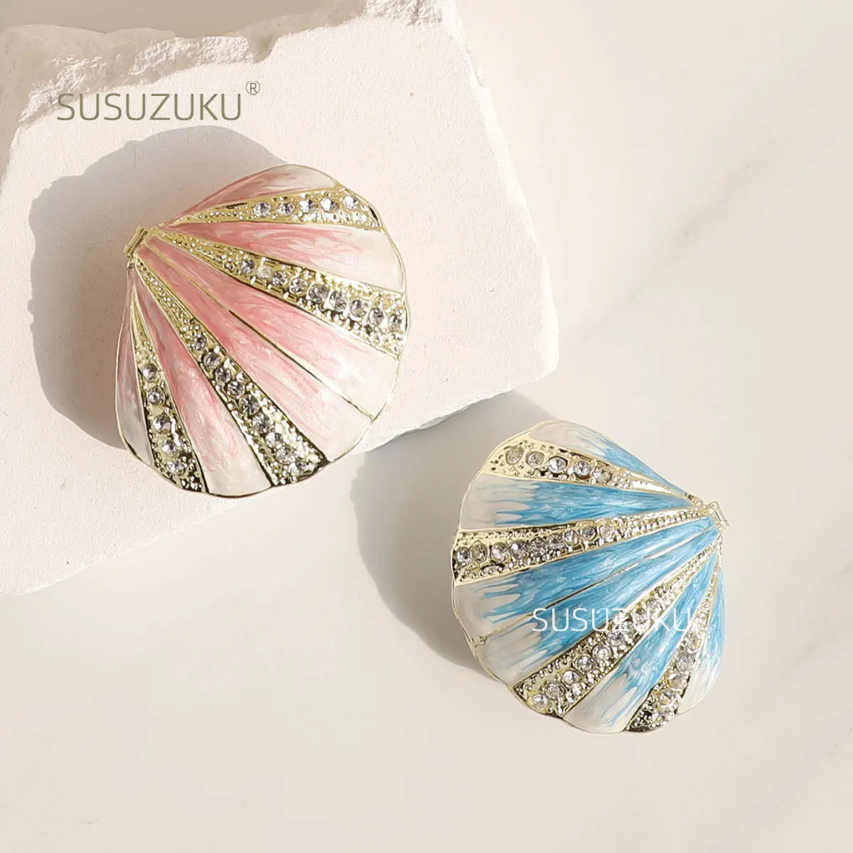 boîte bijoux métal rose blanc bleu doré rayures strass classique élégante transport plateau