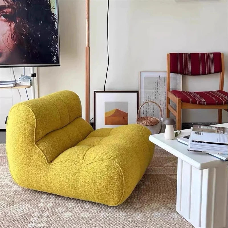 Fauteuil moderne tissu bouclé beige clair coussins d'assise dossier minimaliste