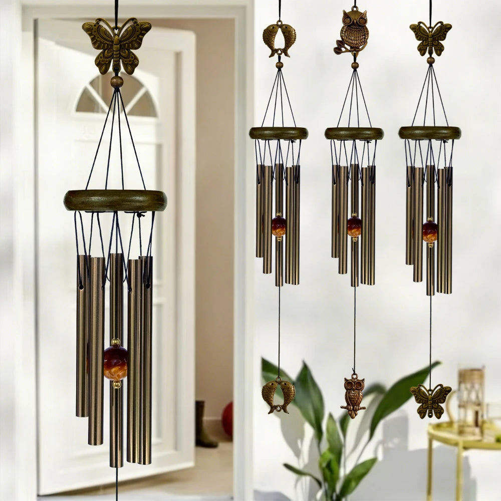 cloches vent clochette artisanale bronze papillons poissons suspendus décor intérieurextérieur ornement métallique plateau bois