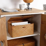 boîtes rangement naturel rustiques tissage paille poignées métalliques stockage maison