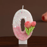 bougies forme chiffres blanc rose vert paillettes fleurs roses feuilles vertes festive tringle boîte