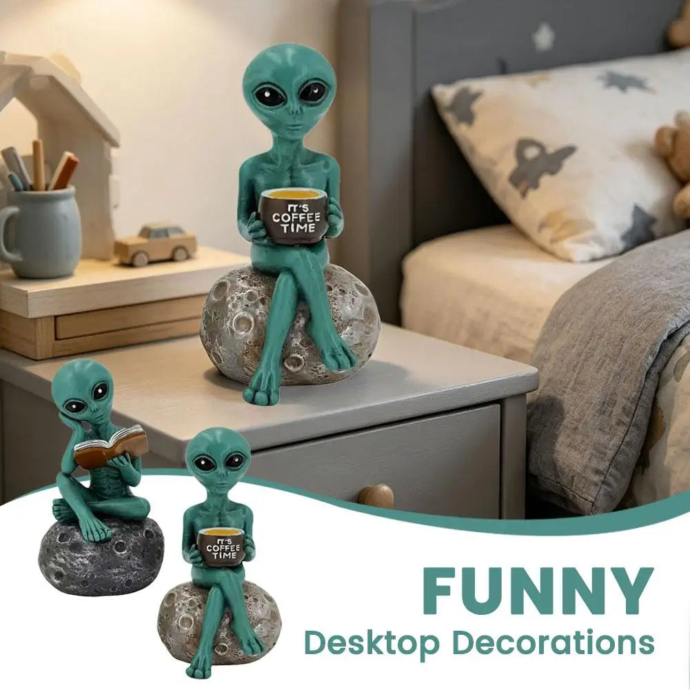 statuette alien humoristique lisant livre décoration jardin vert gris ornement artistique externe