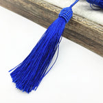 pompons polyester 15cm couleur beige rouge jaune bleu clair rose bleu marine décoratif vêtement