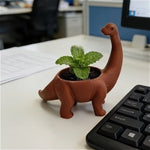 pot plantes forme dinosaure brachiosaure brun terracotta surface lisse aspect mat décoratif ludique menthe