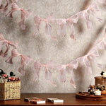 guirlande décorative festives rose noeuds tissu texturé semi transparent mariage anniversaire fille préparation naissance