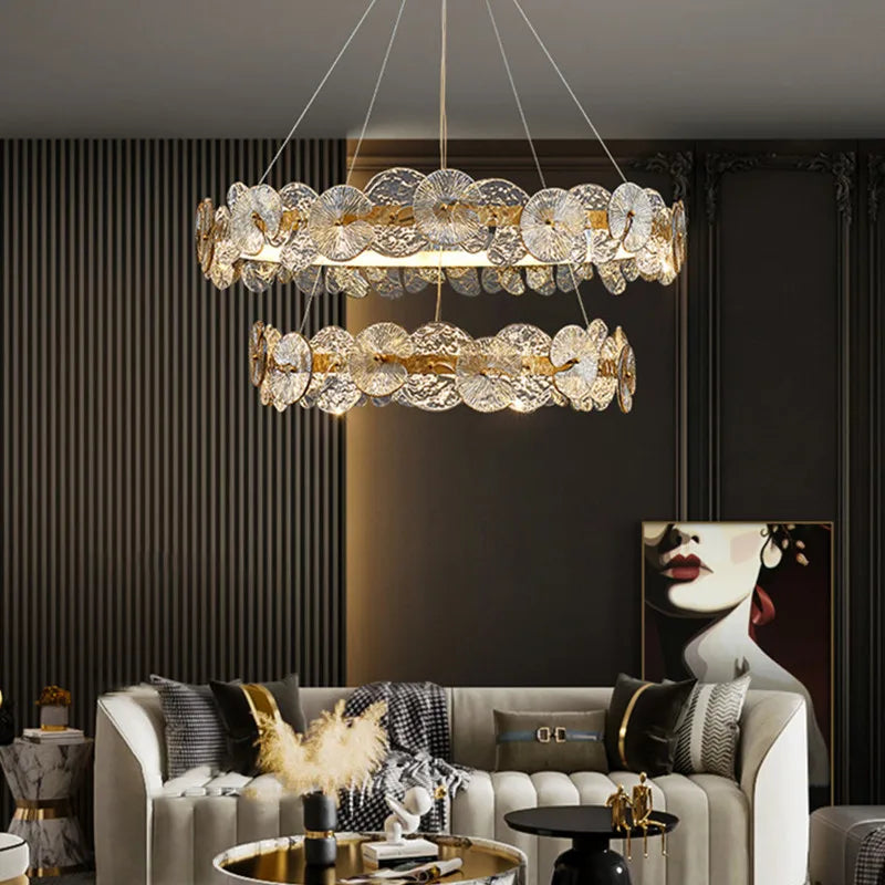 suspension lumineuse moderne dorée transparente disques circulaires texture rugueuse contemporaine élégante chaînes suspendues LED