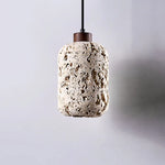 suspension lumineuse moderne pierre texture granulée gris beige noir éclairage ambiance chambre salonhôtel