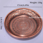 assiettes decoratives ornementales emailees motifs floraux geometriques opalescentes artisanat traditionnel bouddhiste