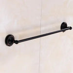 accessoires salle bain noir classiques rondelles dorées porte serviettes savon papier toilette brosse wc