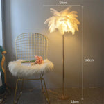 lampe sol moderne plumes blanches dorées bleu turquoise LED éclairage intérieur chambre salon élégant