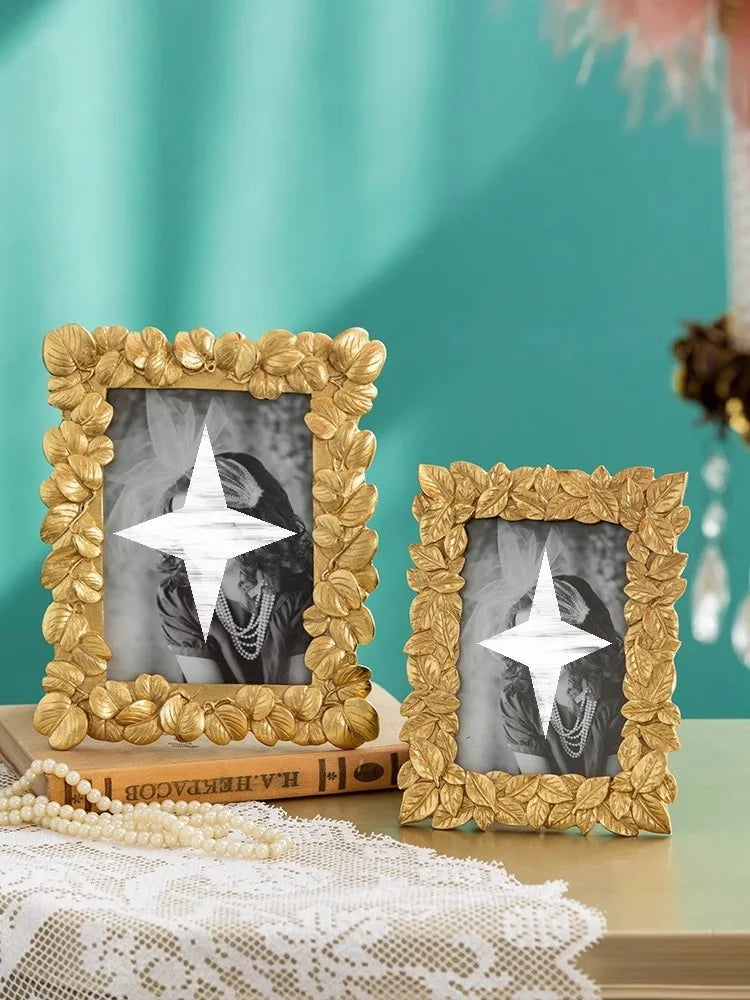 cadre photo or feuilles sculptées vintage opalescent fixation papillon métal doré