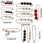 broches ornementales strass classiques élégantes clips or noires rouges