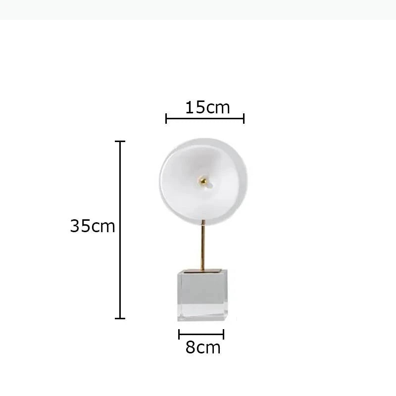 décoration moderne lampes sculpturales transparentes abatjours texturés base cube doré blanc chambre