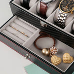 boîte rangement cuir noir montres bijoux élégante boutons fermeture moderne
