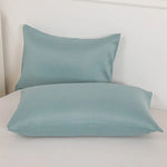 taies d'oreiller polyester non toxiques gris bleu blanc violet solides modernes hospitalières maison respectueuses