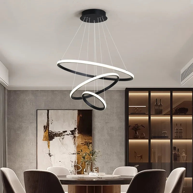 suspension lumineuse moderne anneaux superposés blanc noir or led chambre restaurant étude couloir