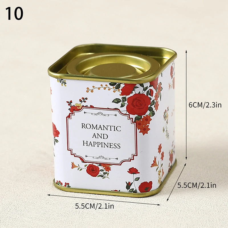 boîtes métal bleu rose noir fleurs vintage capsules étiquettes messages conservation snacks thé