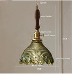 suspension lumineuse vintage vert doré motifs géométriques ampoules câbles chaînes métal