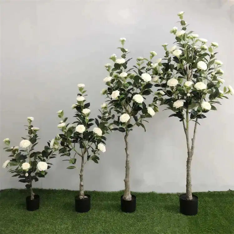 arbre artificiel vert feuilles fleurs roses blancs decoration intérieure moderne pot noir