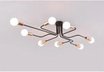 lampe suspension noir blanc moderne scandinave ampoules structure métallique fixations câbles noirs