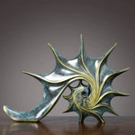 sculpture coquillage vert doré résine spirale moderne art déco brillant