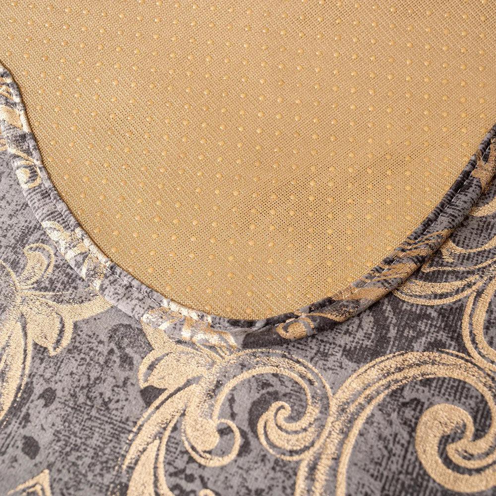 Texture dorée mate avec motif décoratif gris foncé autour des bords.