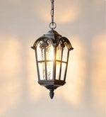 lampe suspendue classique transparente motifs géométriques noir chaîne salon chambrehôtel