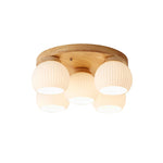 lampe moderne bois blanc abat jour verre motifs plissés éclairage chambre coucher