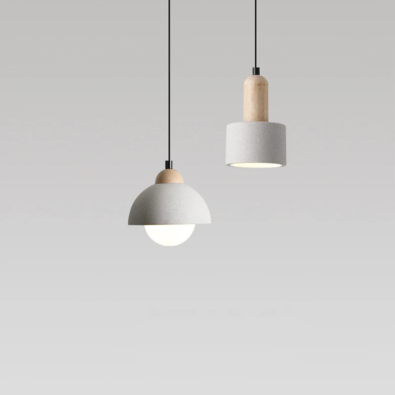 lampe suspendue moderne minimaliste gris clair blanc ampoule led texture béton fixations câble noir