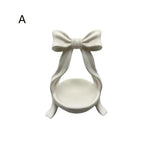 support bijoux blanc satiné nœud décoratif classique décoration intérieure rangement bijoux
