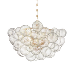 suspension lumineuse moderne verre transparent chaîne dorée led acier poli contemporain lumière chaude chambre