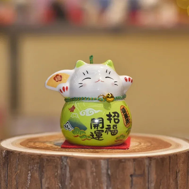 chat souriant tirelire céramique japonaise motifs floraux couleur rouge vert rose bleu jaune