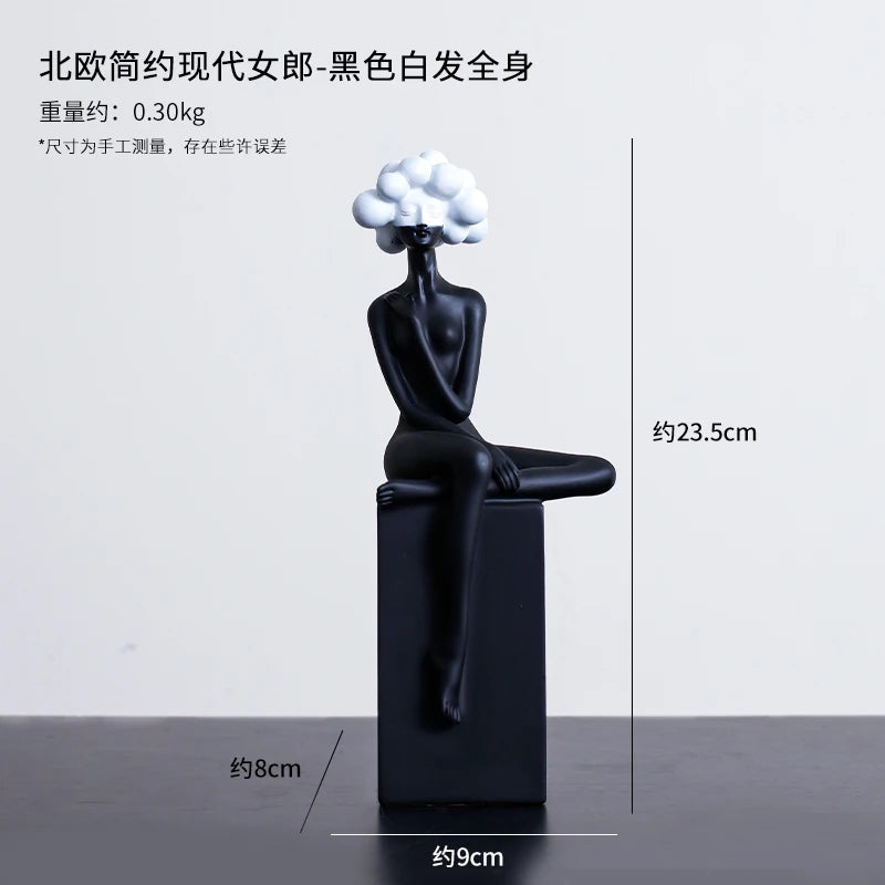 statuette décorative buste féminin noir blanc bleu or moderne minimaliste.surface lisse polie.formes arrondies socle