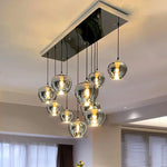 Installation du lustre suspendu avec système pendentif en cordon