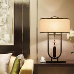 lampe table tissu texturé moderne asiatique pompon abatjour opaque métal noir