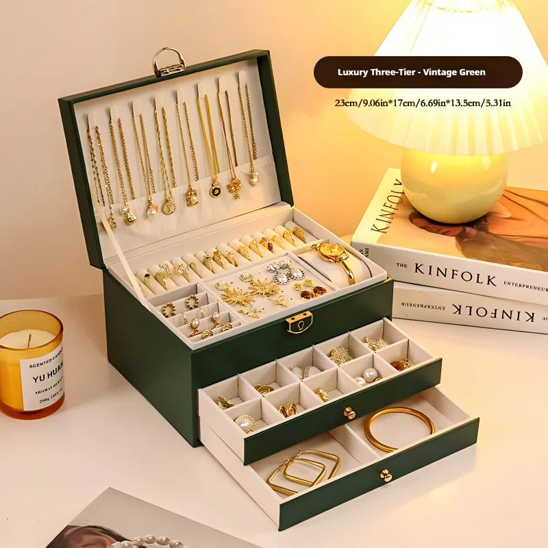 boîte bijoux cuir vert foncé élégante organisation bijoux vintage fermée clé