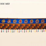 rideau décoration bouddhiste brodé motifs religieux couleurs bleu marron orange vert clips franges multicolores