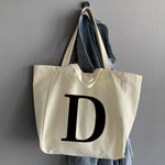 sac main femme toile beige clair lettre noire poignées détachables