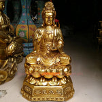 statue bouddhiste dorée or relief floral socle octogonal inscriptions chinoises traditionnelle protection maison