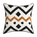 coussin carré rectangulaire beige motifs géométriques dorés pompons chambre salon déco