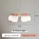 chandelier suspension vert pâle rubans roses abat jour translucides chambre enfant romantique