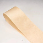 ruban adhésif beige clair texture légèrement rugueuse simple fonctionnel