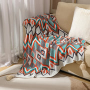 plaid géométrique ethnique acrylique tissage losanges chevrons tassels blanc orange turquoise