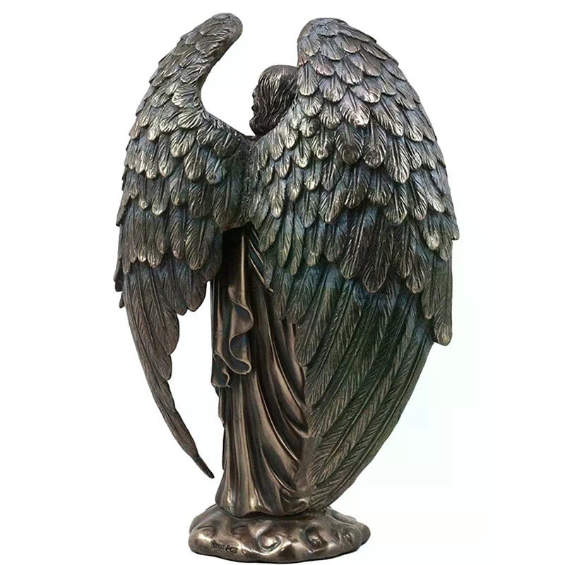 figurines anges ailes plumeuses bronze patiné symbolique épée serpent religieux spiritualité