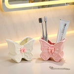 rangement mural papillon rose blanche brosses dents pinceaux maquillage deco girly fantaisiste
