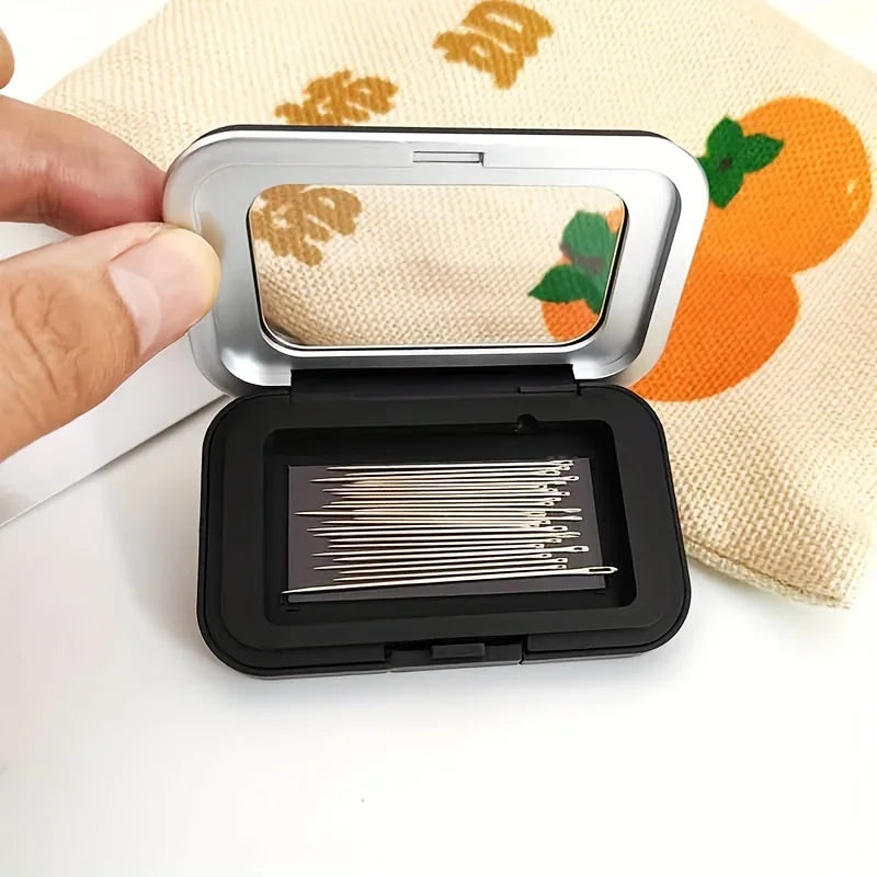boîte aiguilles noire miroir transparent moderne rangement aiguilles coudre utilitaire compact élégante pratique travailler