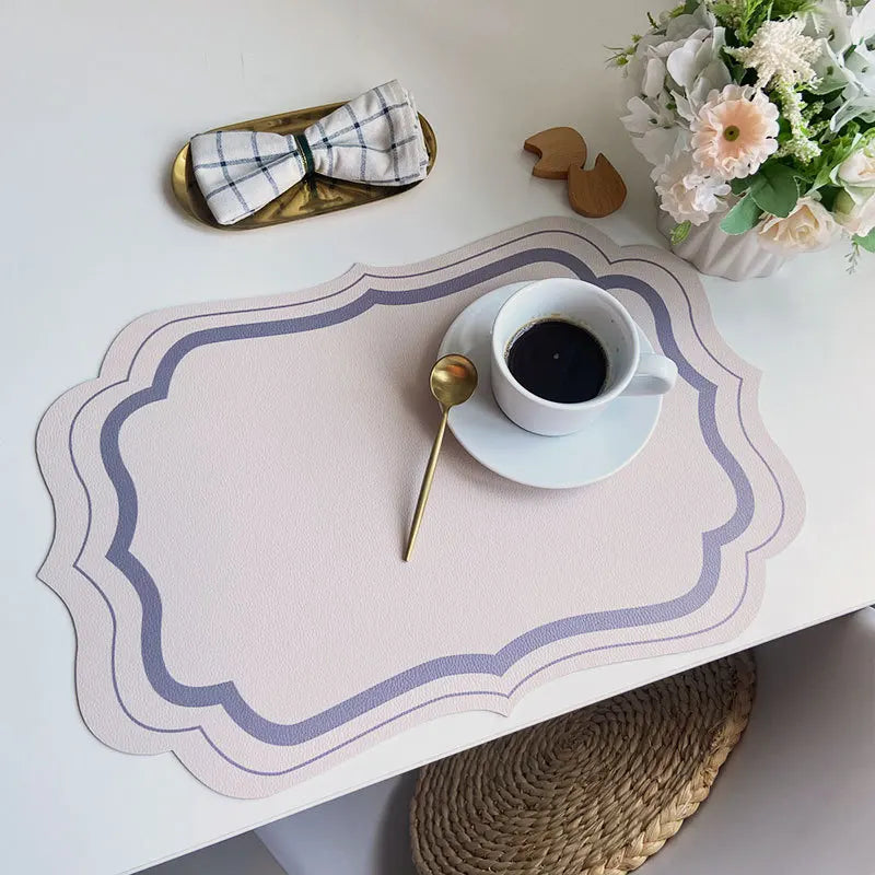 serviettes table moderne motif géométrique rose clair vert bleu beige ornementées