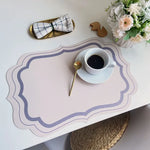 serviettes table moderne motif géométrique rose clair vert bleu beige ornementées